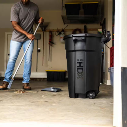 32 Gal. Black Outdoor Vented Trash Can with Wheels, Domed Lid, Rounded Handles, and Reinforced Foothold